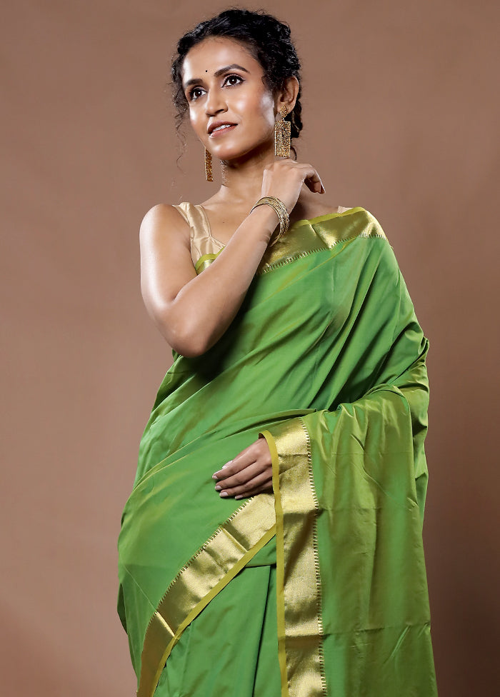 Green Kanjivaram Silk Saree With Blouse Piece