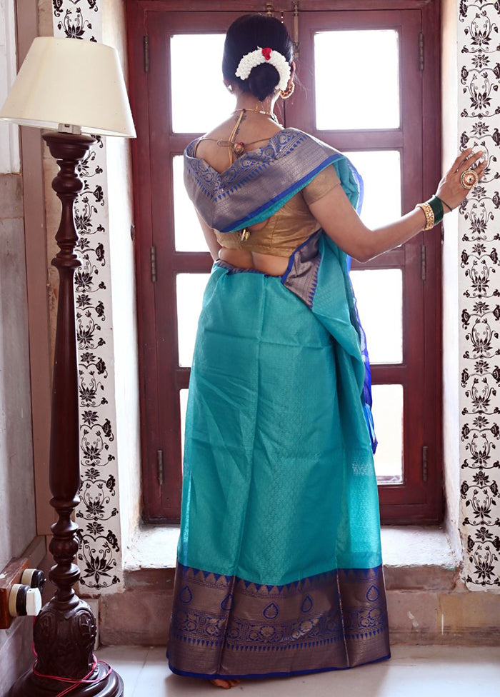 Turquoise Blue Silk Saree With Blouse Piece
