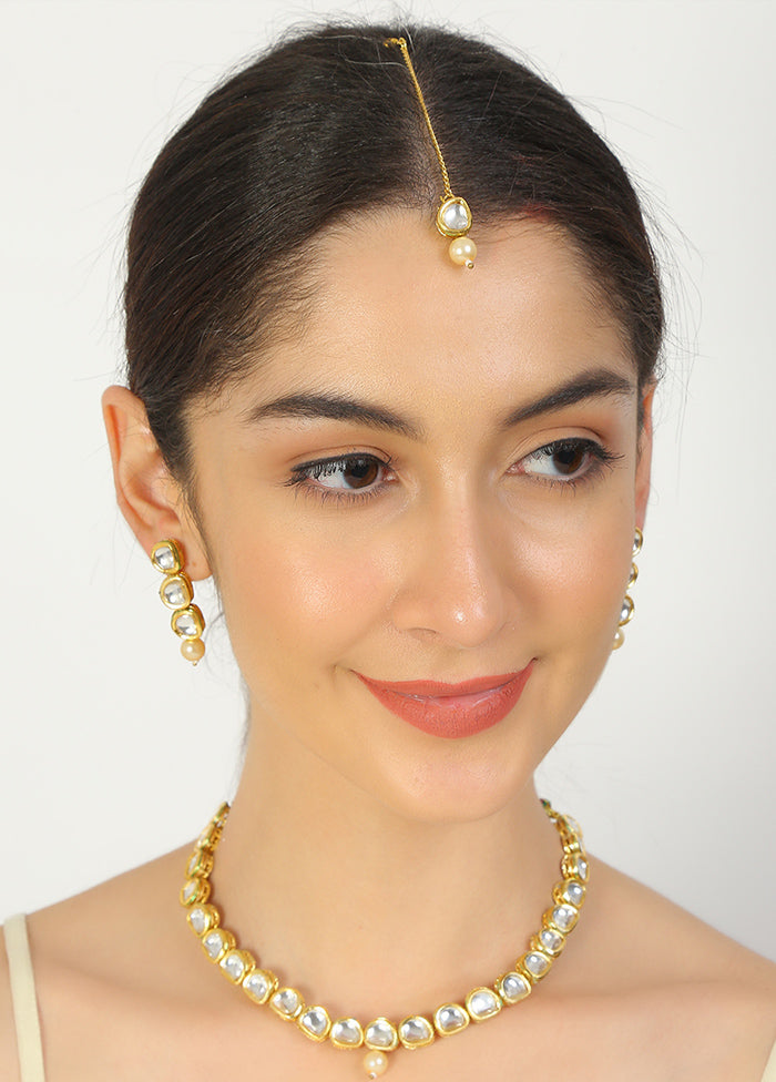 Golden Kundan Work Copper And Alloy Necklace With Earrings And Mangtik