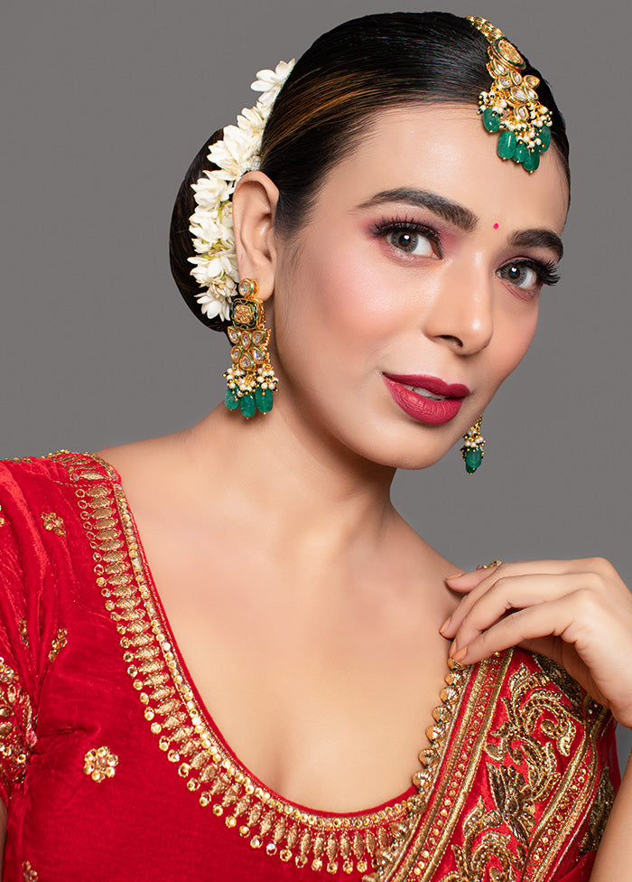 Green Gold Toned Kundan Earrings With Mangtika