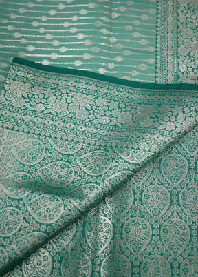 Green Uppada Silk Saree With Blouse Piece