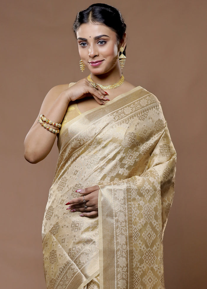 Cream Tissue Silk Saree With Blouse Piece