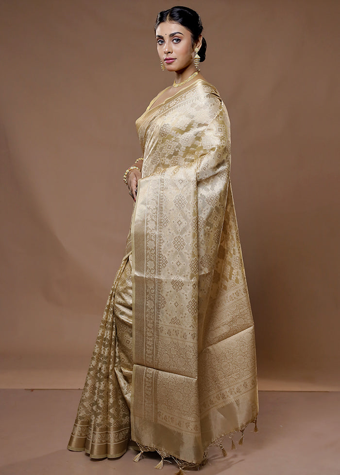 Cream Tissue Silk Saree With Blouse Piece