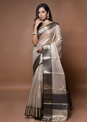 Cream Tissue Silk Saree With Blouse Piece