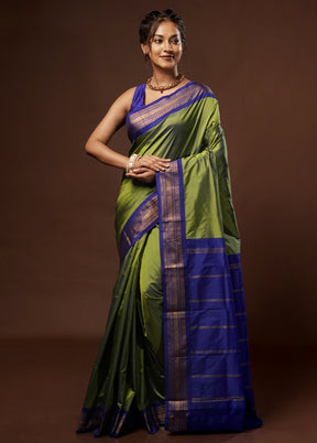 Green Kanjivaram Silk Saree With Blouse Piece