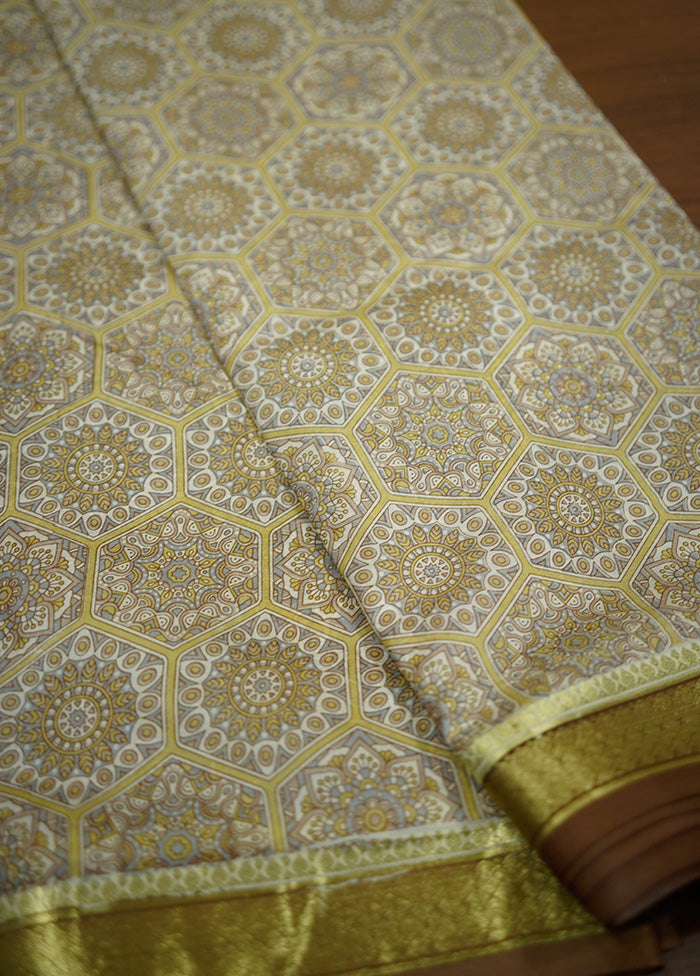 Cream Printed Pure Silk Saree With Blouse Piece