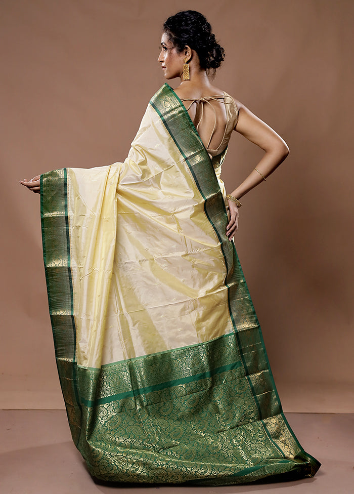 Cream Kanjivaram Silk Saree With Blouse Piece