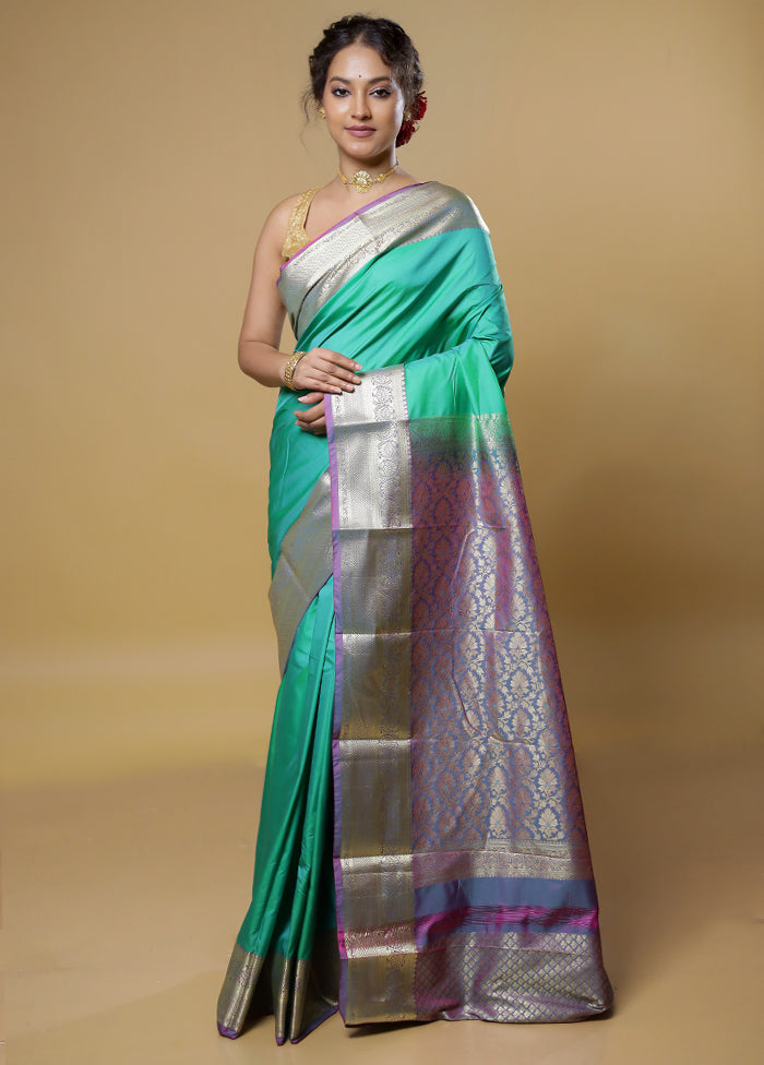 Green Kanjivaram Silk Saree With Blouse Piece