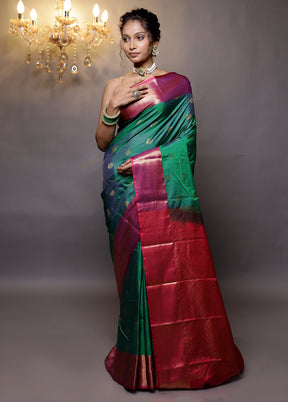 Green Kanjivaram Silk Saree With Blouse Piece