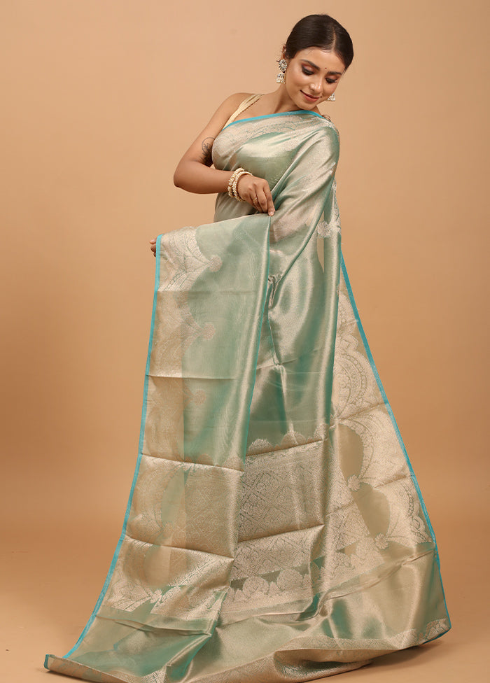 Green Tissue Silk Saree With Blouse Piece