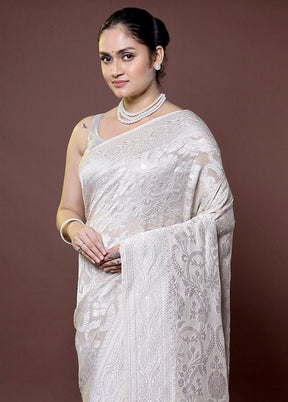 White Handloom Pure Georgette Saree With Blouse Piece