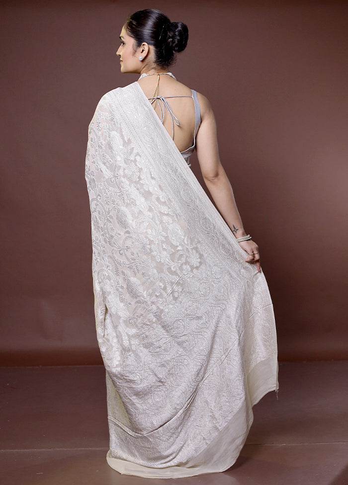 White Handloom Pure Georgette Saree With Blouse Piece