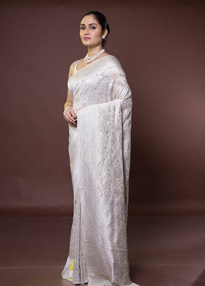 White Handloom Pure Georgette Saree With Blouse Piece