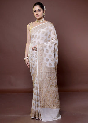 White Handloom Pure Georgette Saree With Blouse Piece