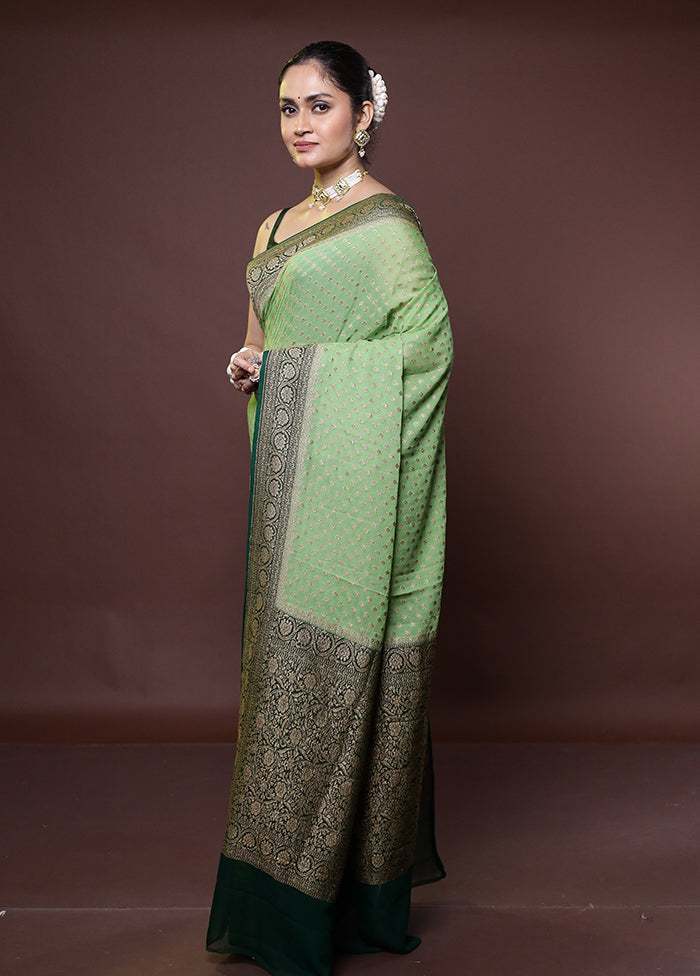 Green Handloom Pure Georgette Saree With Blouse Piece