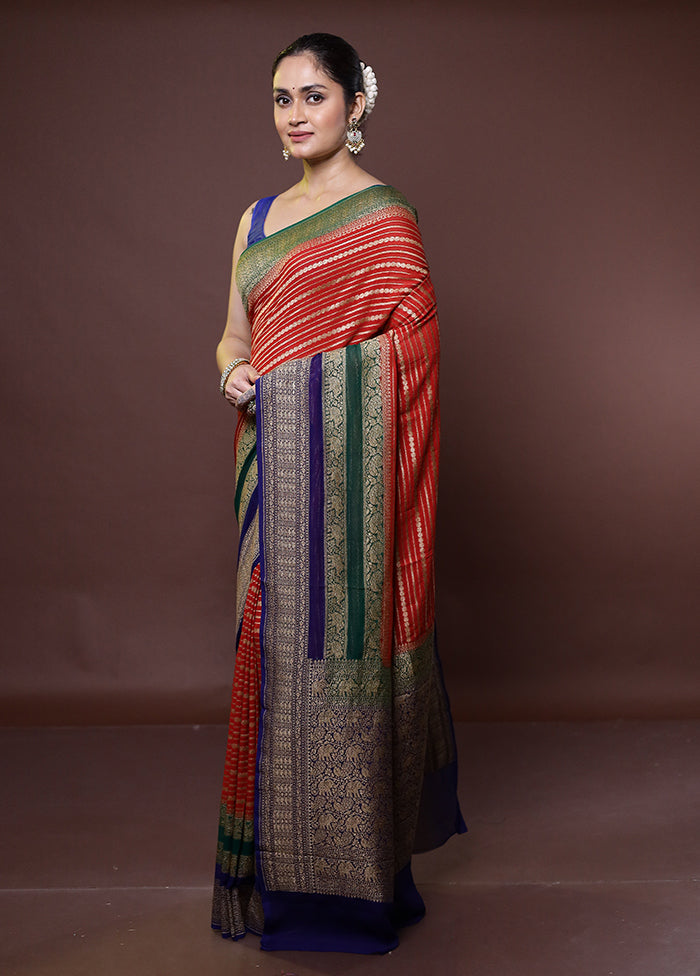 Red Handloom Pure Georgette Saree With Blouse Piece