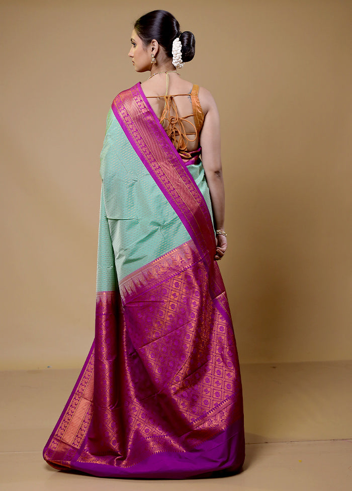 Green Kanjivaram Silk Saree With Blouse Piece