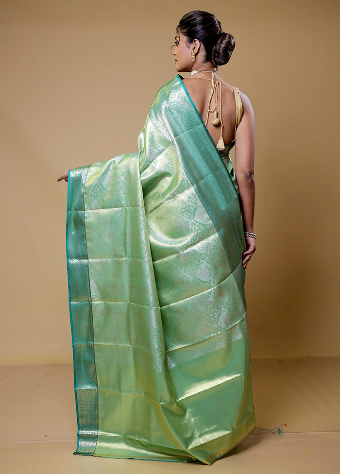 Green Kanjivaram Silk Saree With Blouse Piece