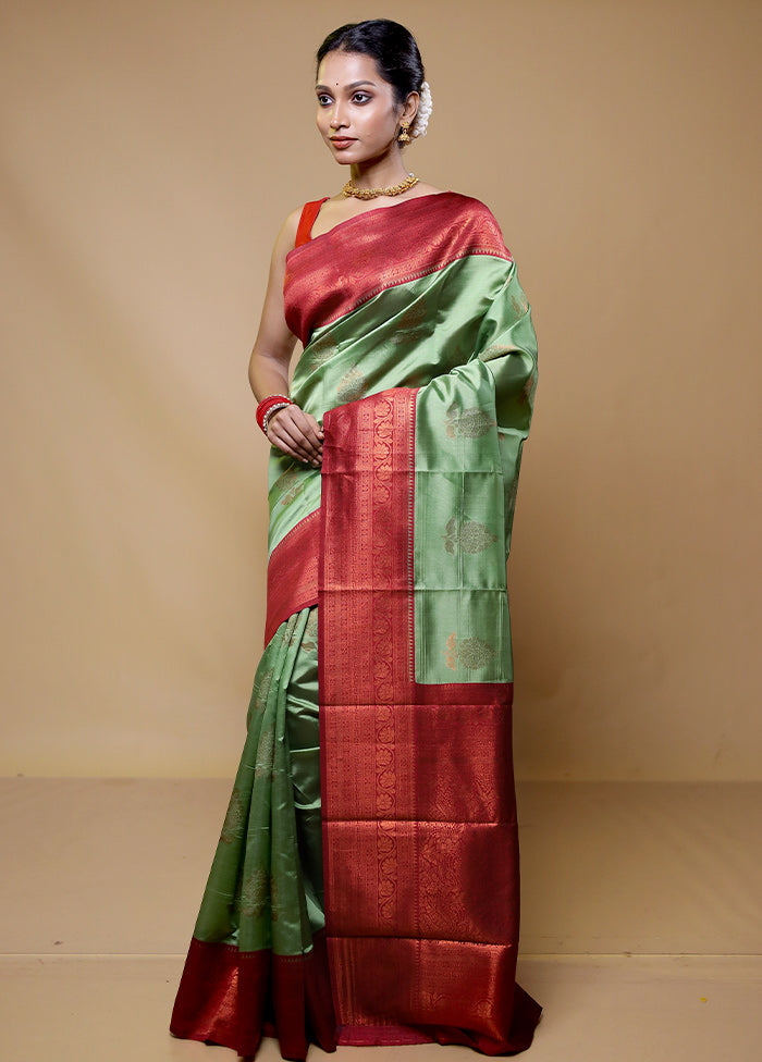 Green Kanjivaram Silk Saree With Blouse Piece