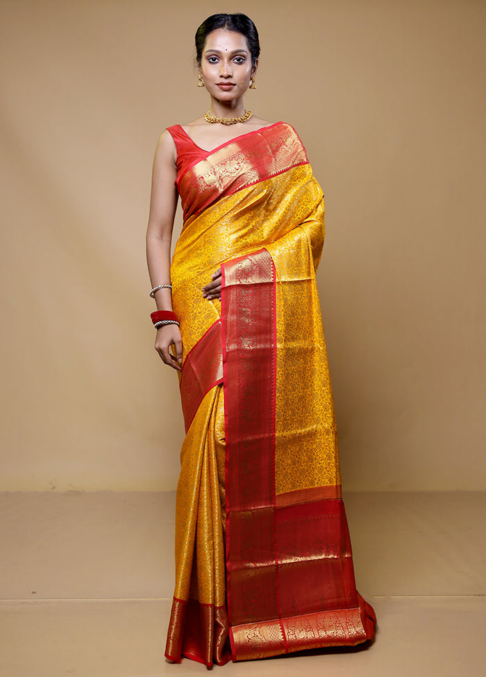 Yellow Kanjivaram Silk Saree With Blouse Piece