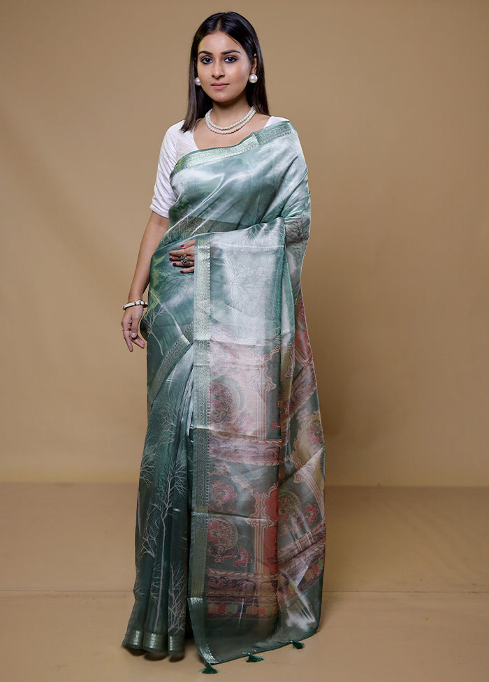 Green Tissue Silk Saree With Blouse Piece