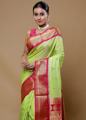 Green Kanjivaram Silk Saree With Blouse Piece