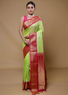 Green Kanjivaram Silk Saree With Blouse Piece