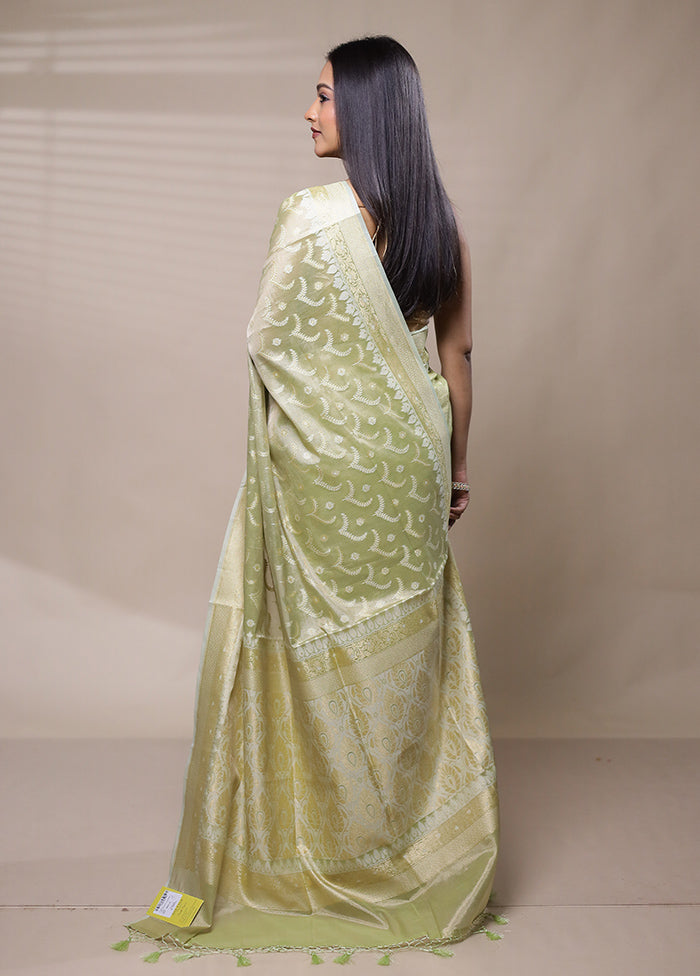 Green Tissue Silk Saree With Blouse Piece