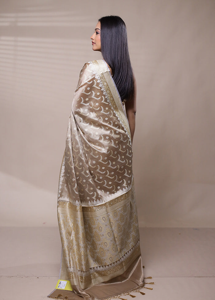 Cream Tissue Silk Saree With Blouse Piece