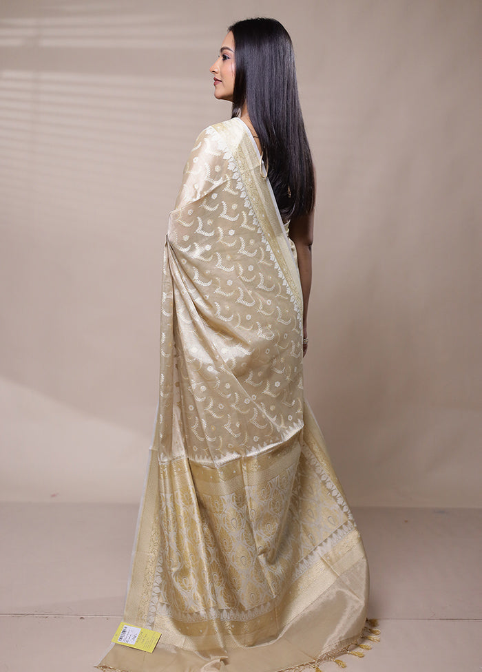 Cream Tissue Silk Saree With Blouse Piece