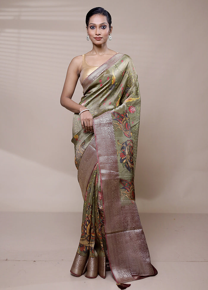 Green Tissue Silk Saree With Blouse Piece