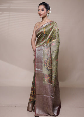 Green Tissue Silk Saree With Blouse Piece