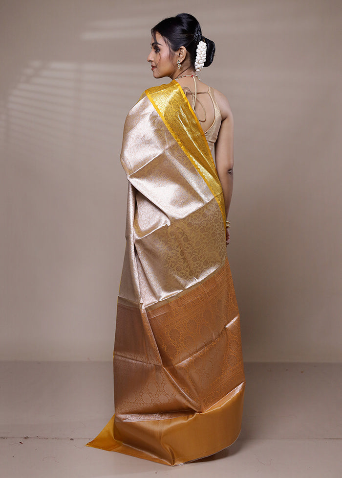 Cream Tissue Silk Saree With Blouse Piece