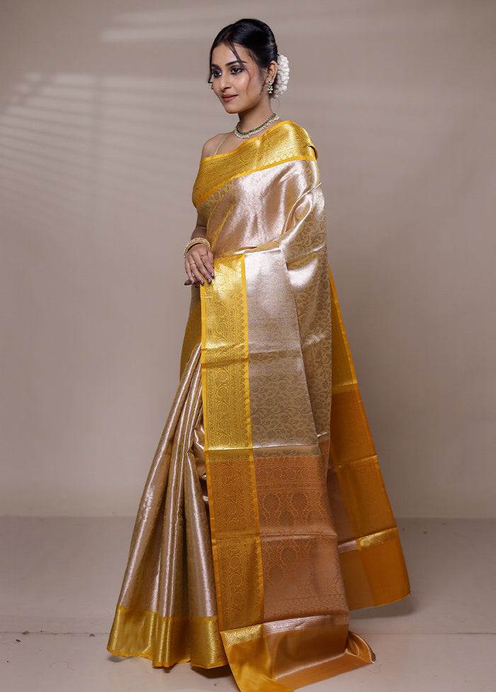 Cream Tissue Silk Saree With Blouse Piece