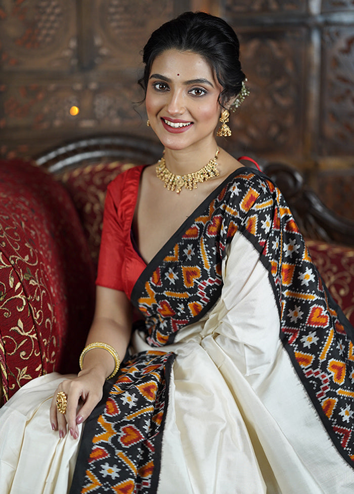 White Handloom Ikkat Pure Silk Saree With Blouse Piece