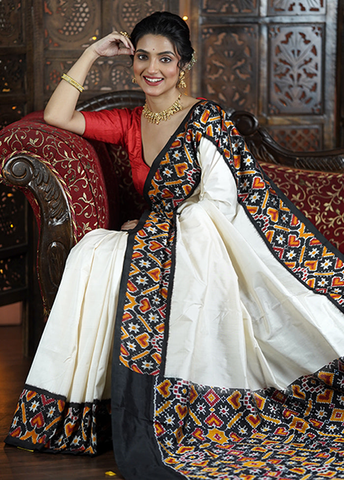 White Handloom Ikkat Pure Silk Saree With Blouse Piece