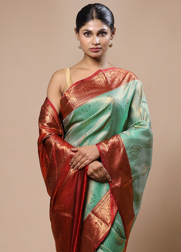 Green Kanjivaram Silk Saree With Blouse Piece