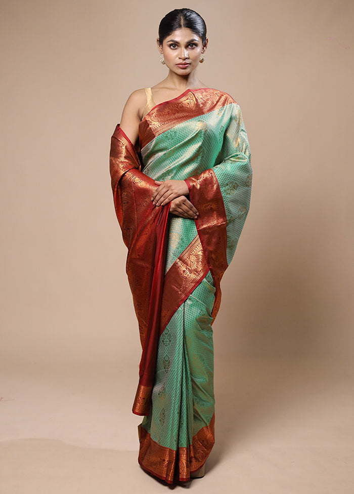 Green Kanjivaram Silk Saree With Blouse Piece