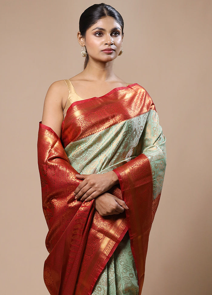 Green Kanjivaram Silk Saree With Blouse Piece