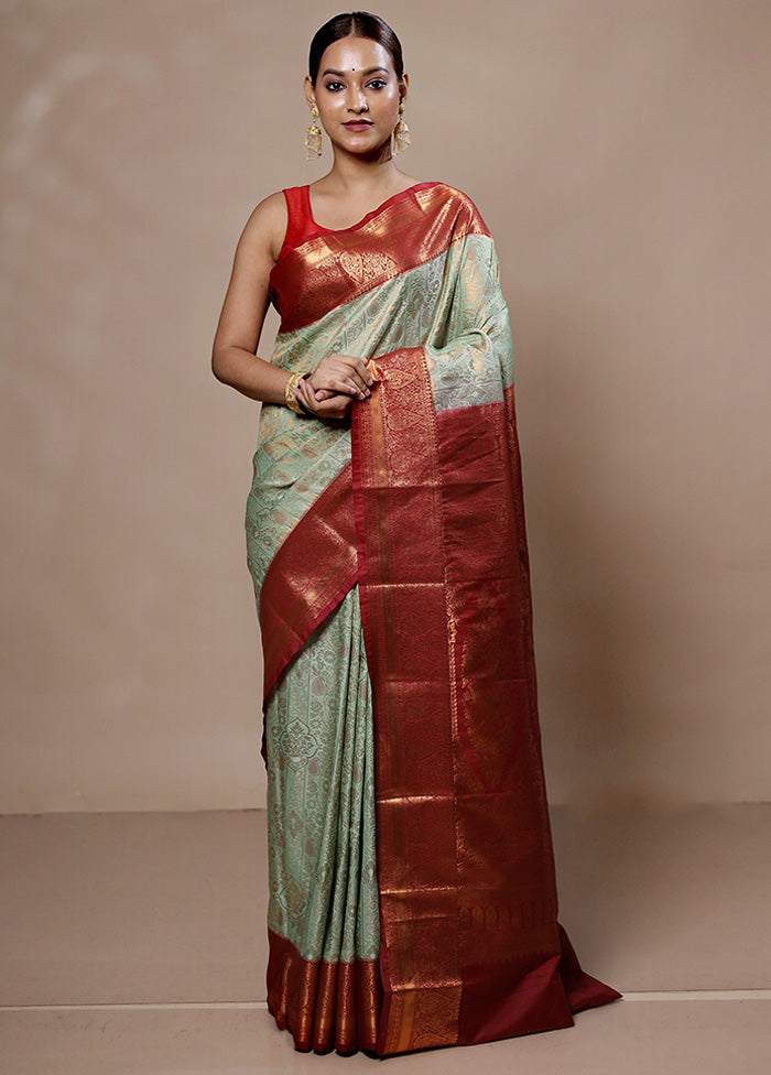 Green Kanjivaram Silk Saree With Blouse Piece