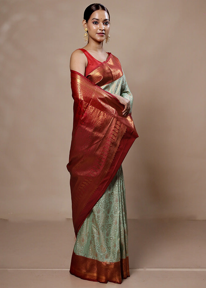 Green Kanjivaram Silk Saree With Blouse Piece