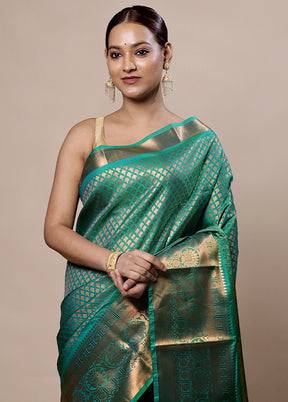 Green Kanjivaram Silk Saree With Blouse Piece