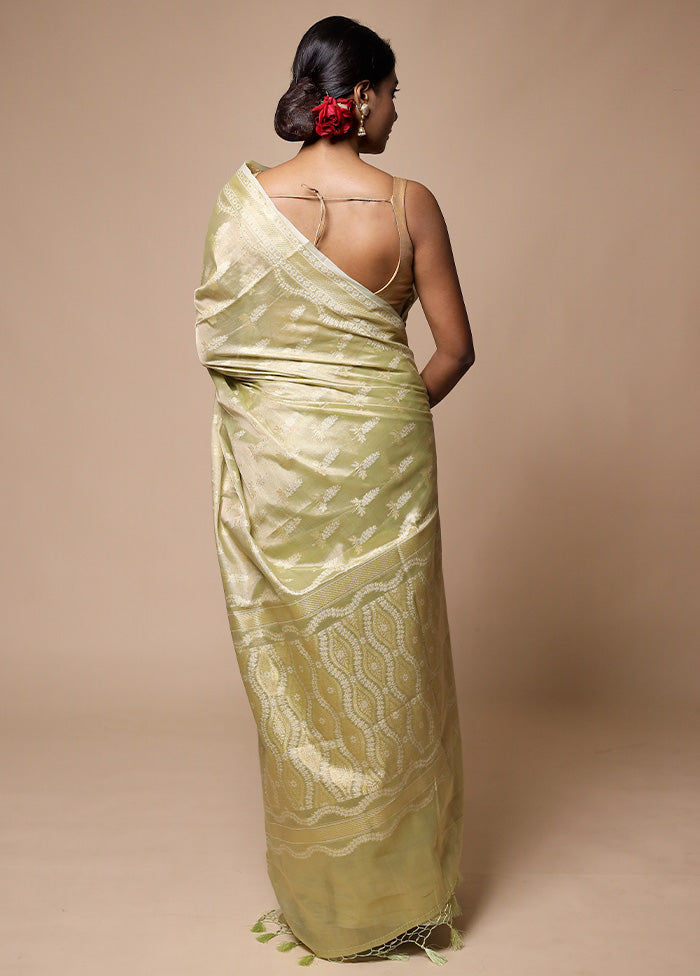 Green Tissue Silk Saree With Blouse Piece