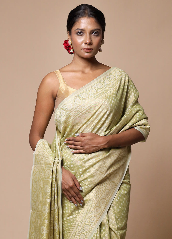 Green Tissue Silk Saree With Blouse Piece