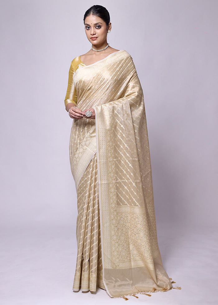 Cream Tissue Silk Saree With Blouse Piece