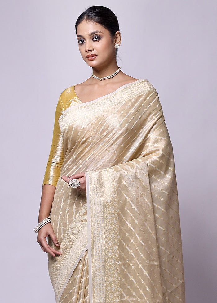 Cream Tissue Silk Saree With Blouse Piece