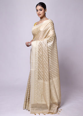 Cream Tissue Silk Saree With Blouse Piece