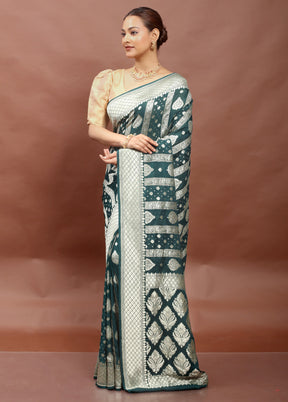 Green Handloom Pure Georgette Saree With Blouse Piece