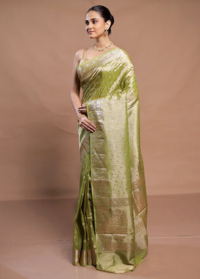 Green Tissue Silk Saree With Blouse Piece