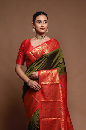 Green Kanjivaram Silk Saree With Blouse Piece